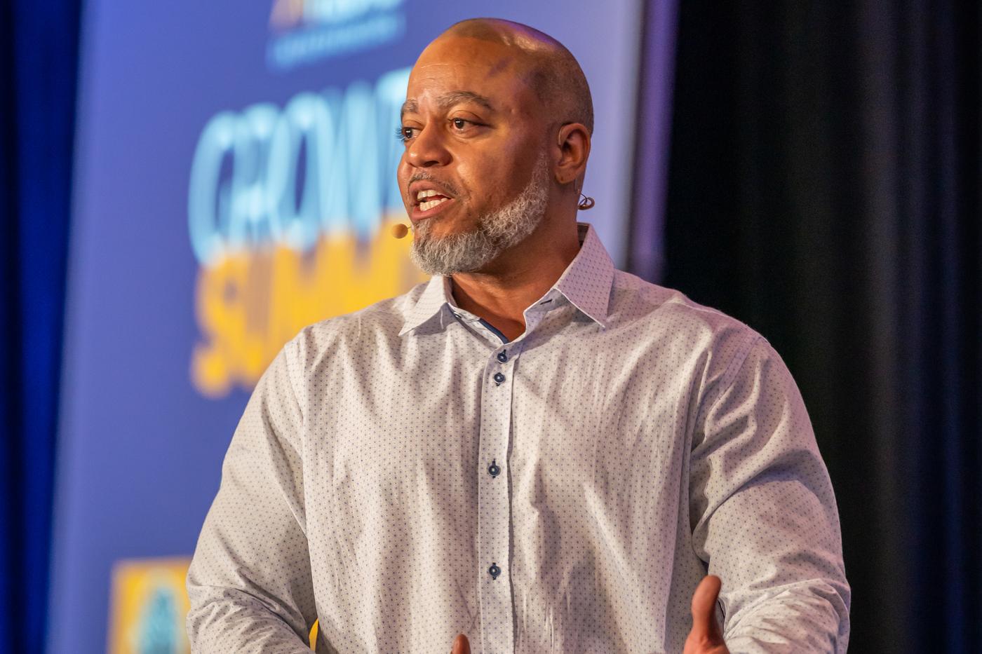 Princeton Clark in conversation on stage before an audience